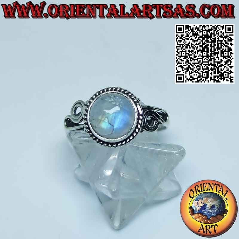 Silver ring with ornate round moonstone and spiral on the sides