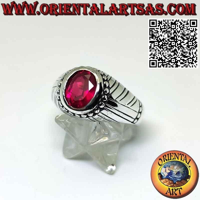Anello in argento con rubino sintetico con borchie e rigato sui lati