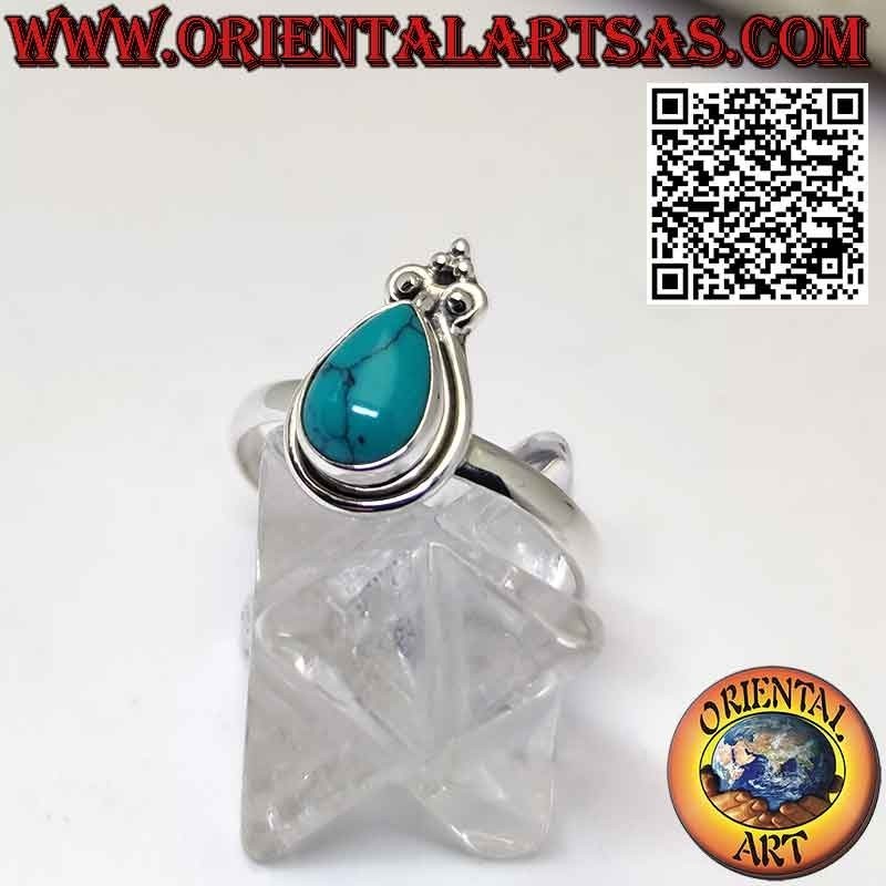 Bague en argent avec turquoise gouttelette à bord lisse et couronne de lys