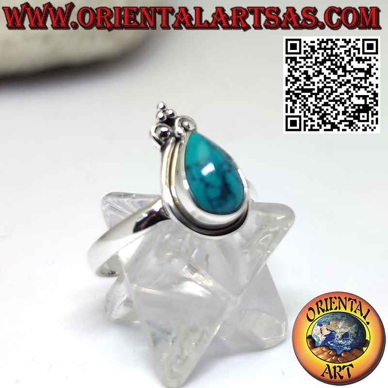 Bague en argent avec turquoise gouttelette à bord lisse et couronne de lys