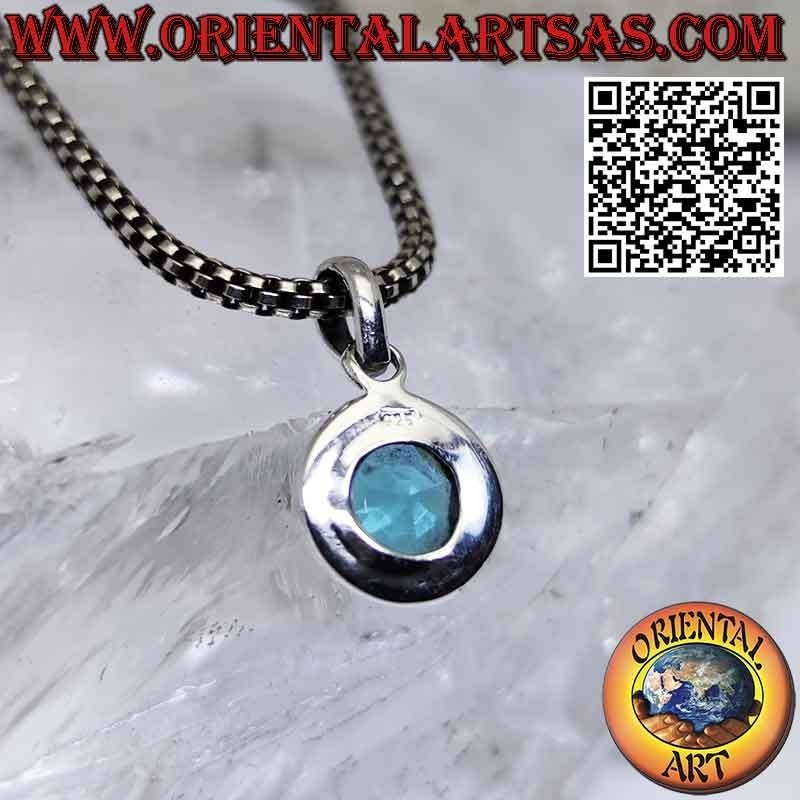Silver pendant with faceted round blue topaz with simple edge