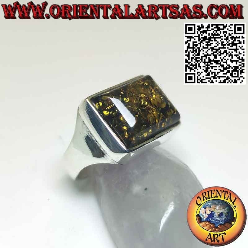 Rectangular silver ring with a large green Baltic amber