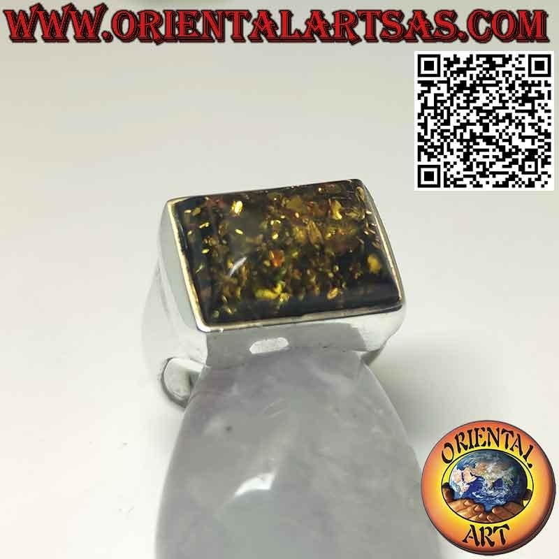 Rectangular silver ring with a large green Baltic amber