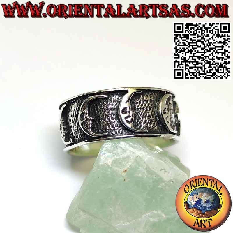 Wide band silver ring with high relief moons