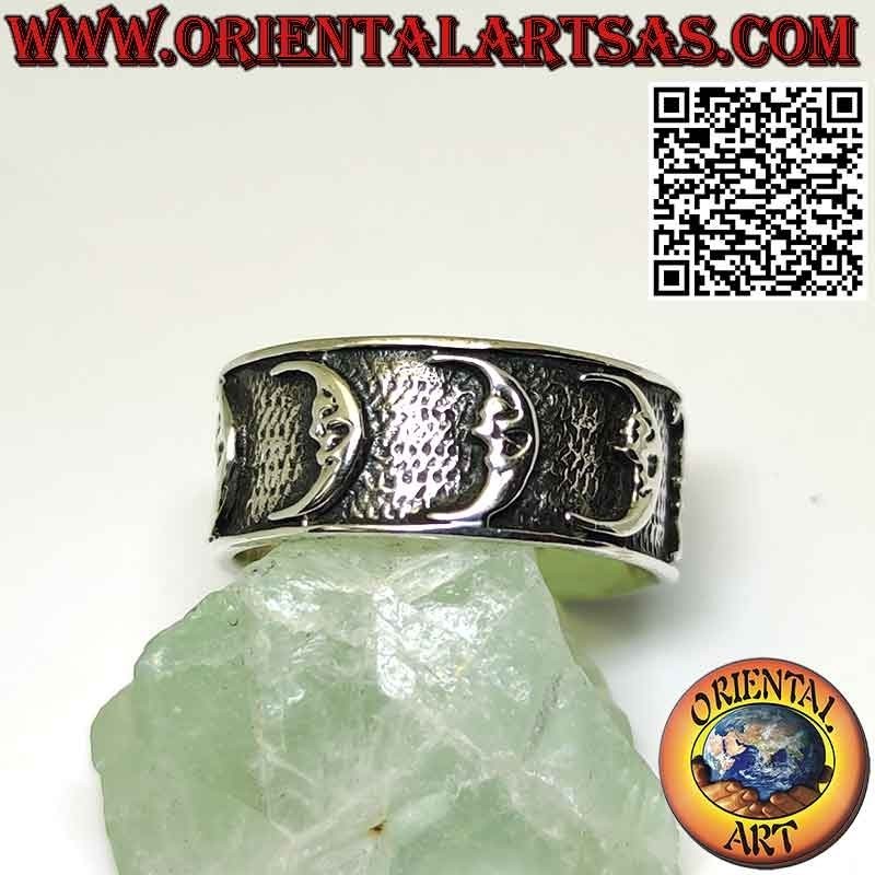 Anillo de plata de banda ancha con lunas en alto relieve
