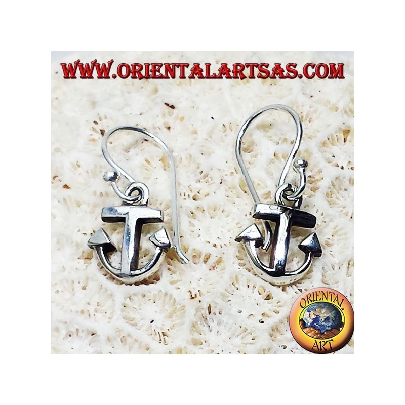 Silver earrings, still simple