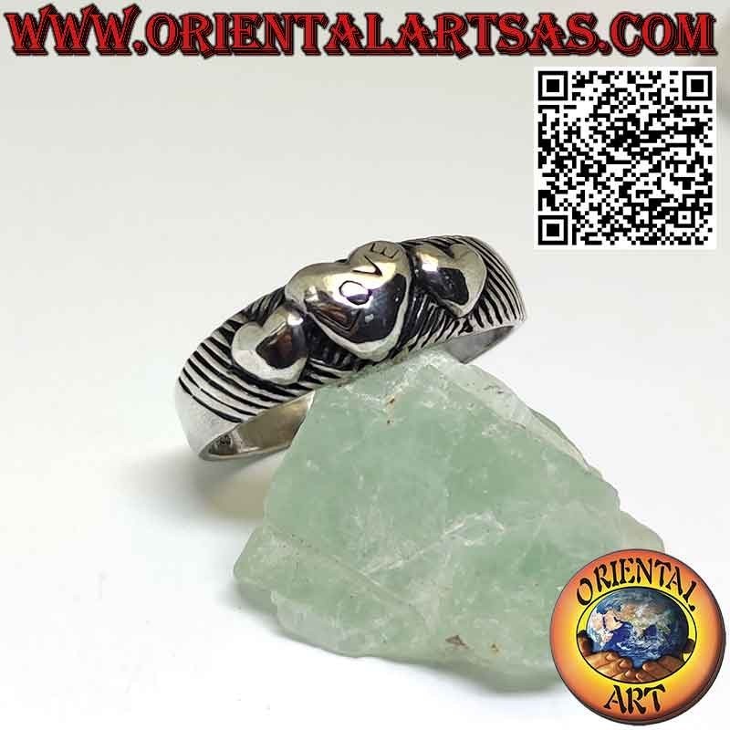 Anello in argento con tre cuori crescente e decrescente al altorilievo