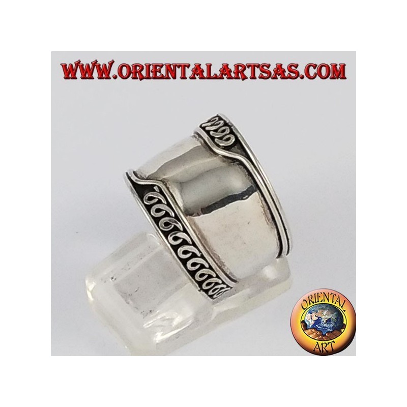 Silver wide band ring, Bali with asymmetric machined edges