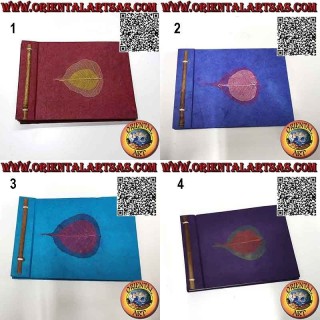 Photo album in Nepalese rice paper and black leaf sheets, (14 x 19 cm)
