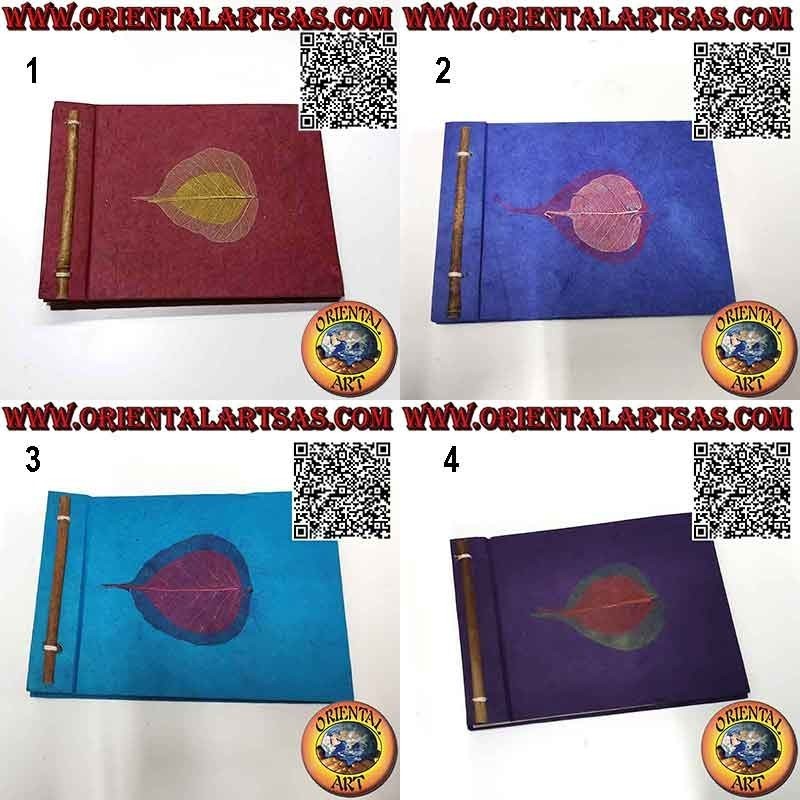 Photo album in Nepalese rice paper and black leaf sheets, (14 x 19 cm)