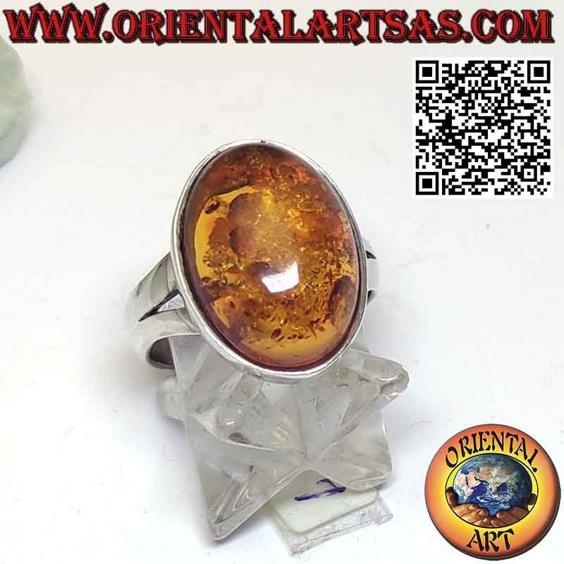 Silver ring with a beautiful oval amber in a simple setting
