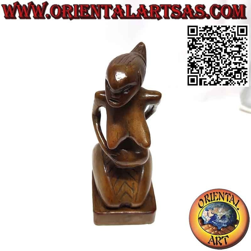 Ancestral sculpture of the goddess of abundance in wood from Papua