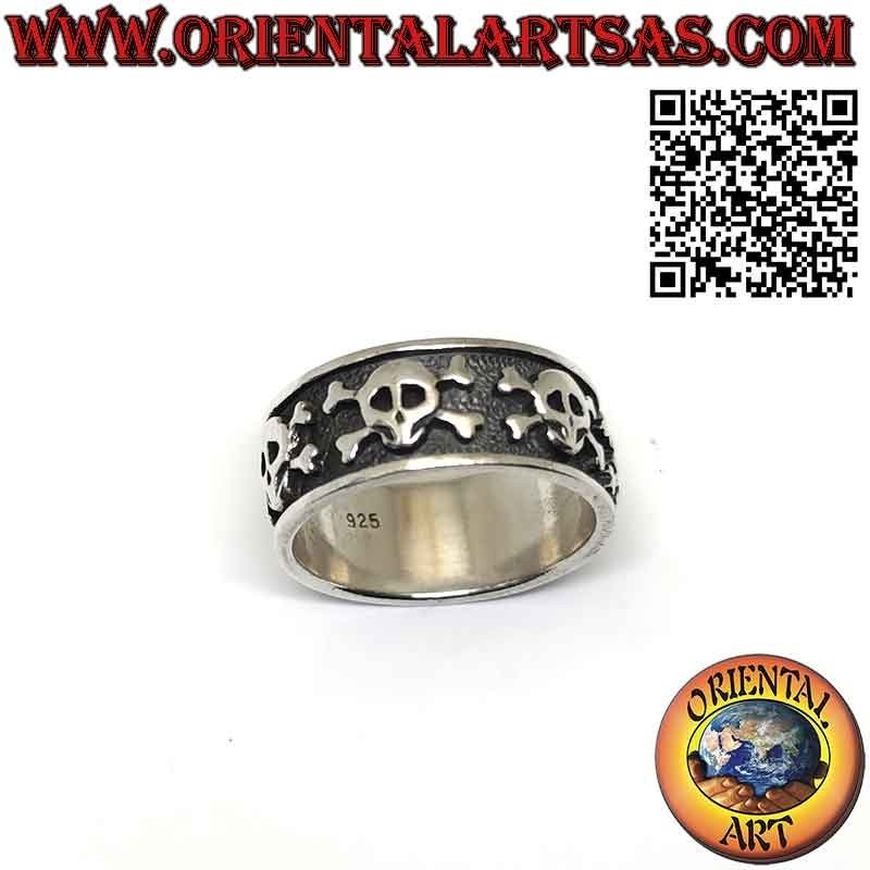 Wide band silver ring with 5 skulls with high relief bones