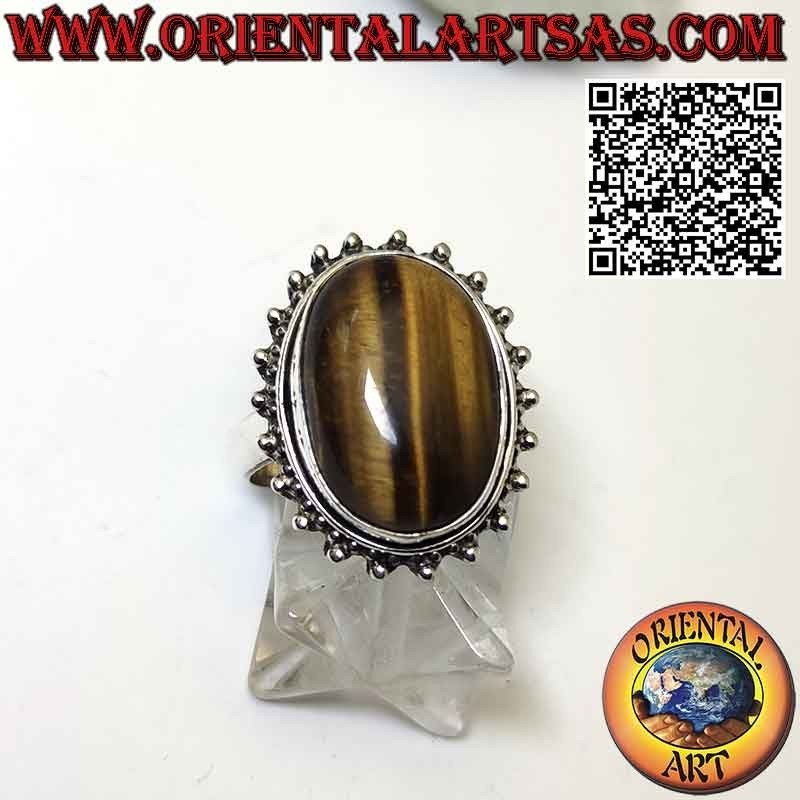 Silver flower ring with large oval cabochon tiger eye surrounded by dots