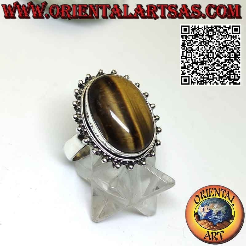 Anillo de flores de plata con gran ojo de tigre cabujón ovalado rodeado de puntos