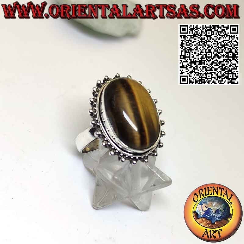 Silver flower ring with large oval cabochon tiger eye surrounded by dots