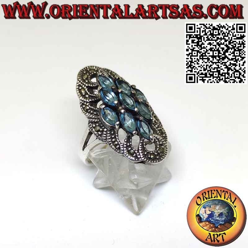 Bague en argent Spool avec topaze bleue 9 navettes et marcassite