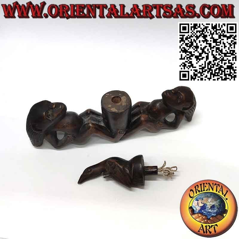 Rare sculpture of two men praising the bird of fertility