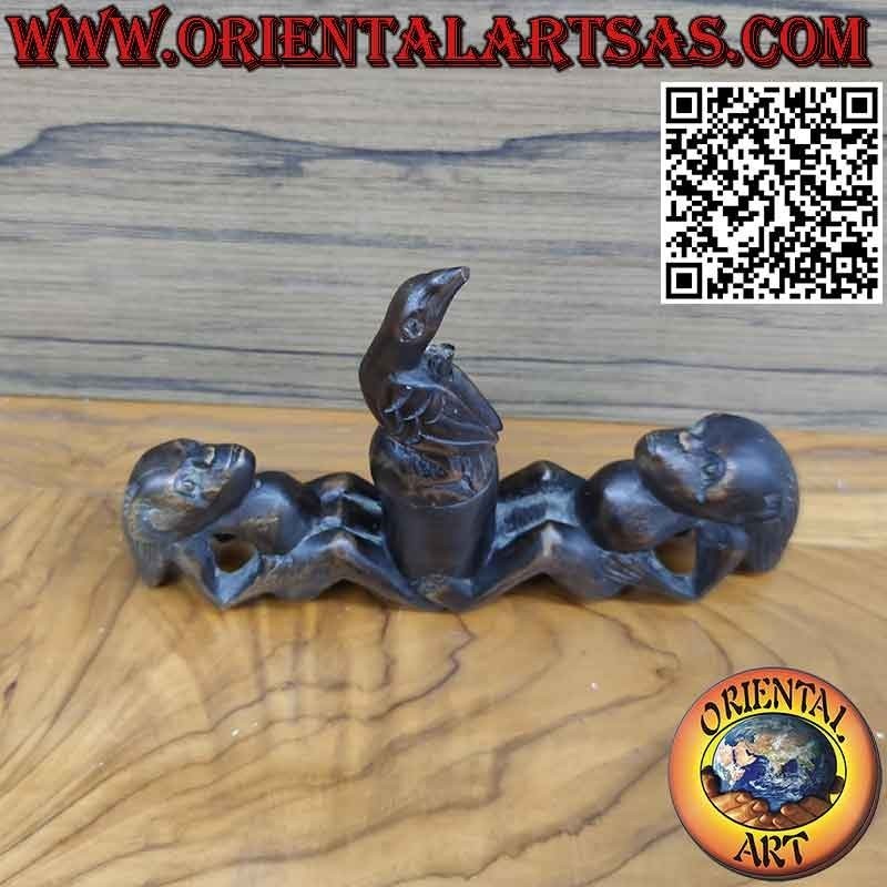 Rare sculpture of two men praising the bird of fertility