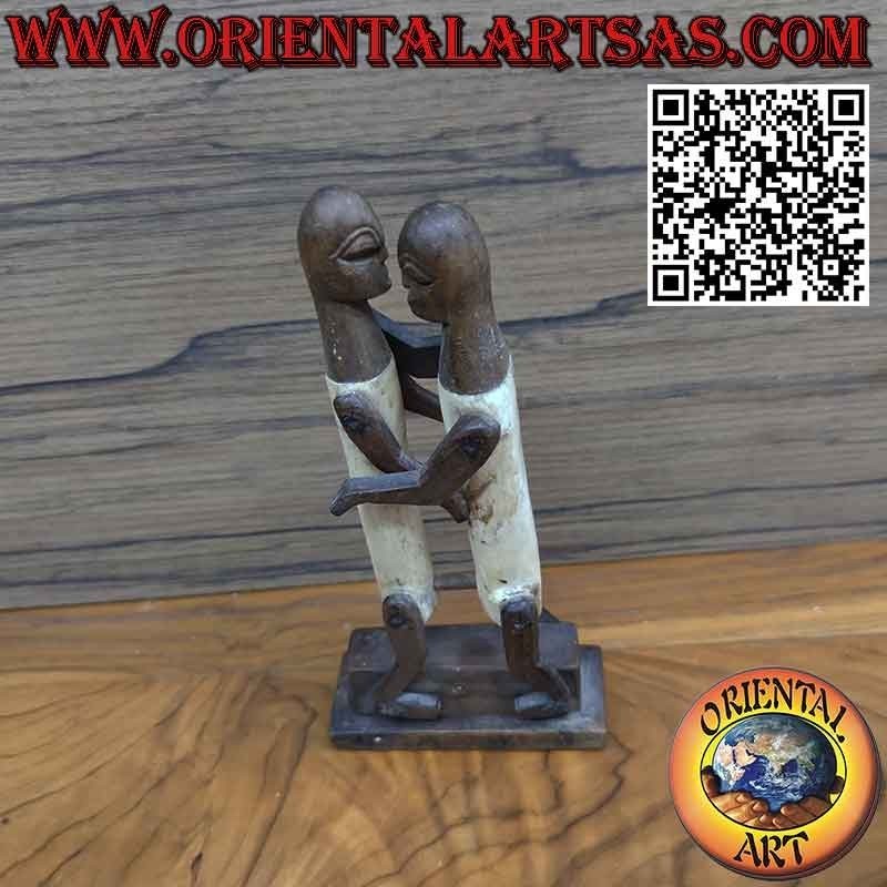 Sculpture couple in love Dayak Borneo in tribal primitive ebony bone