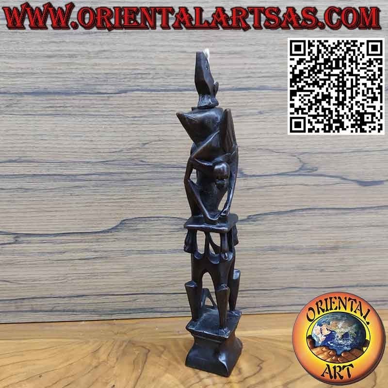 Rara escultura de ébano de hombres 1 pelícano 1 murciélago iluminado