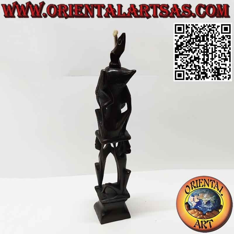 Rare ebony sculpture of men 1 pelican 1 illuminated bat