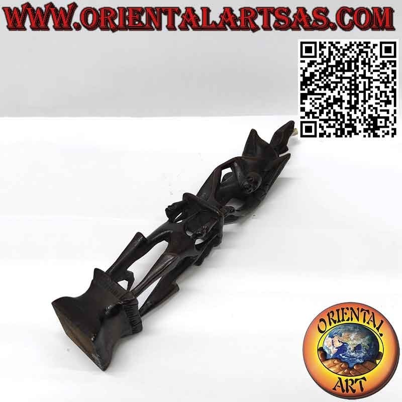 Rare ebony sculpture of men 1 pelican 1 illuminated bat