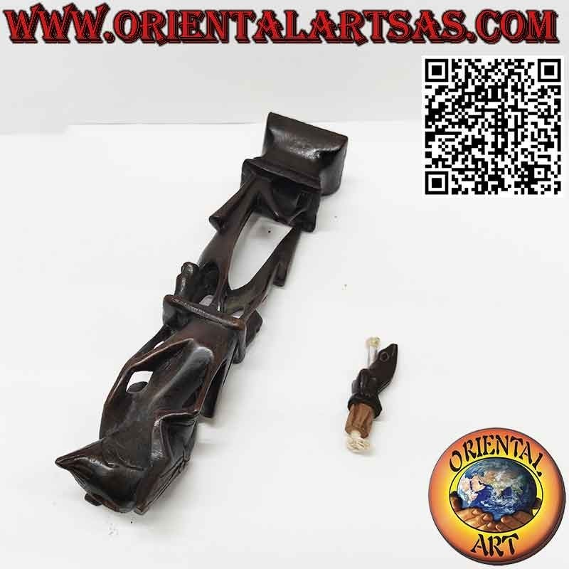 Rare ebony sculpture of men 1 pelican 1 illuminated bat