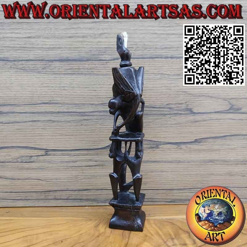 Rare ebony sculpture of men 1 pelican 1 illuminated bat