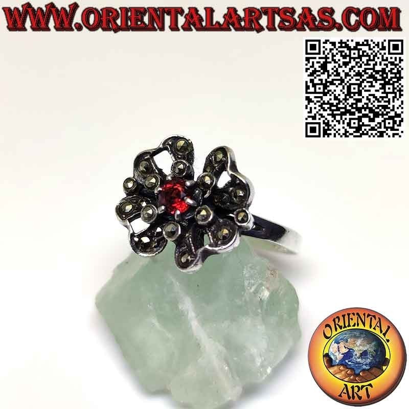 Flower silver ring with a central round garnet and marcasites