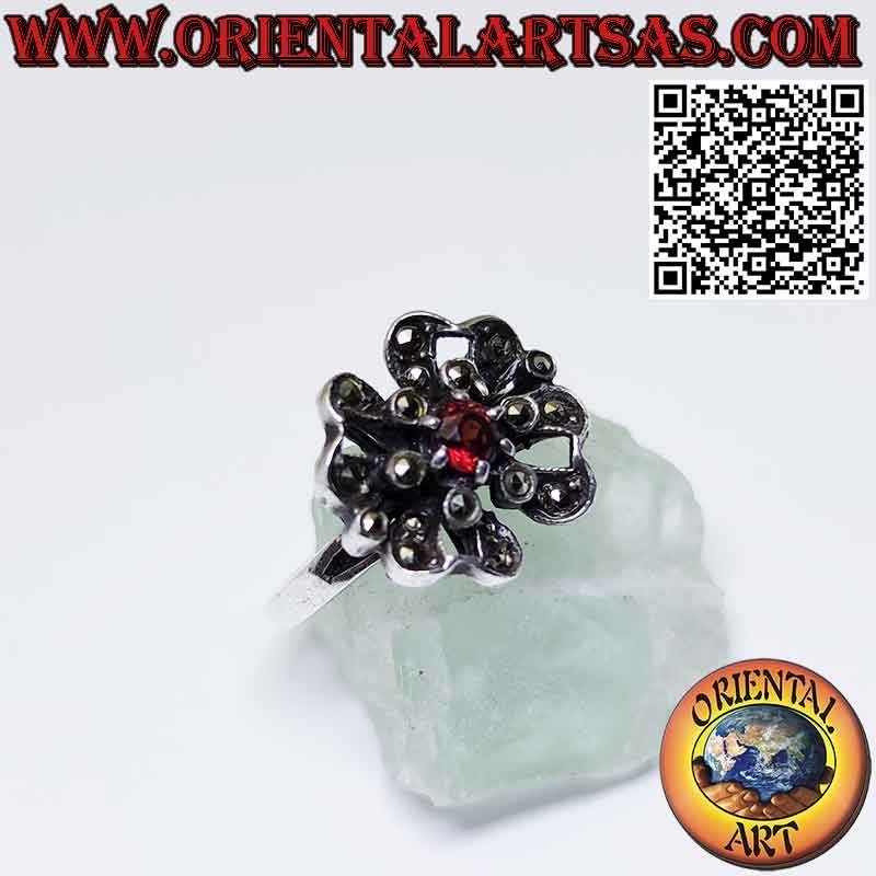 Flower silver ring with a central round garnet and marcasites