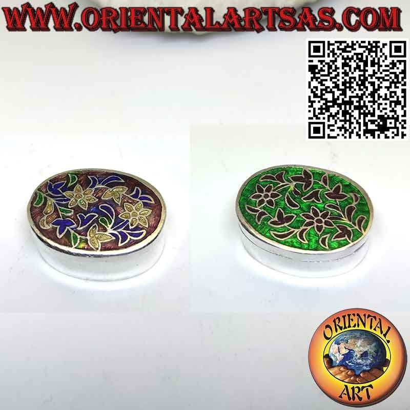 Petit coffret en argent ellipsoïdal ciselé et émaillé floral
