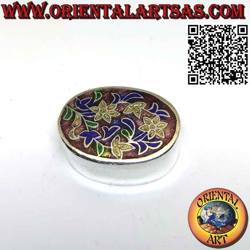 Petit coffret en argent ellipsoïdal ciselé et émaillé floral