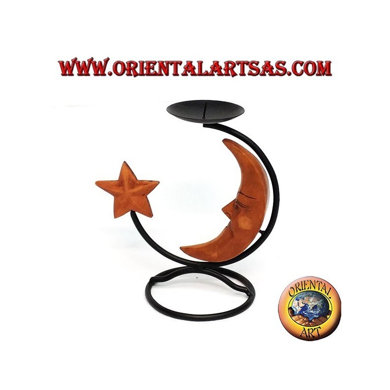 Candelero del hierro con la luna y la estrella de madera