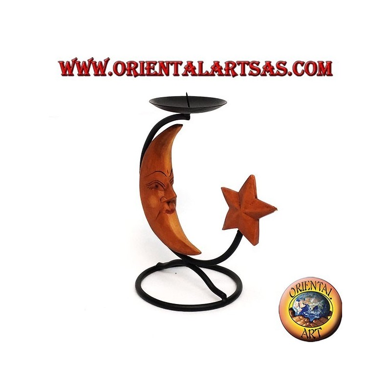 Iron candlestick with moon and star in wood