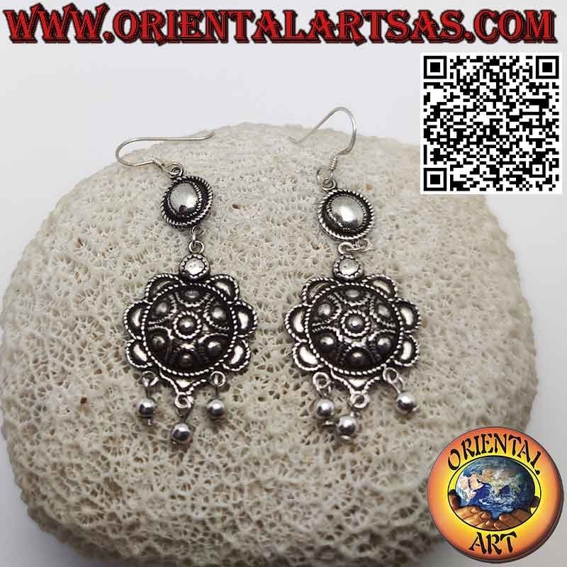 Long silver studded shield earrings with three pendant spheres