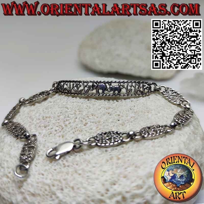 Bracelet semi-rigide en argent 925 avec 2 éléphants sculptés au centre