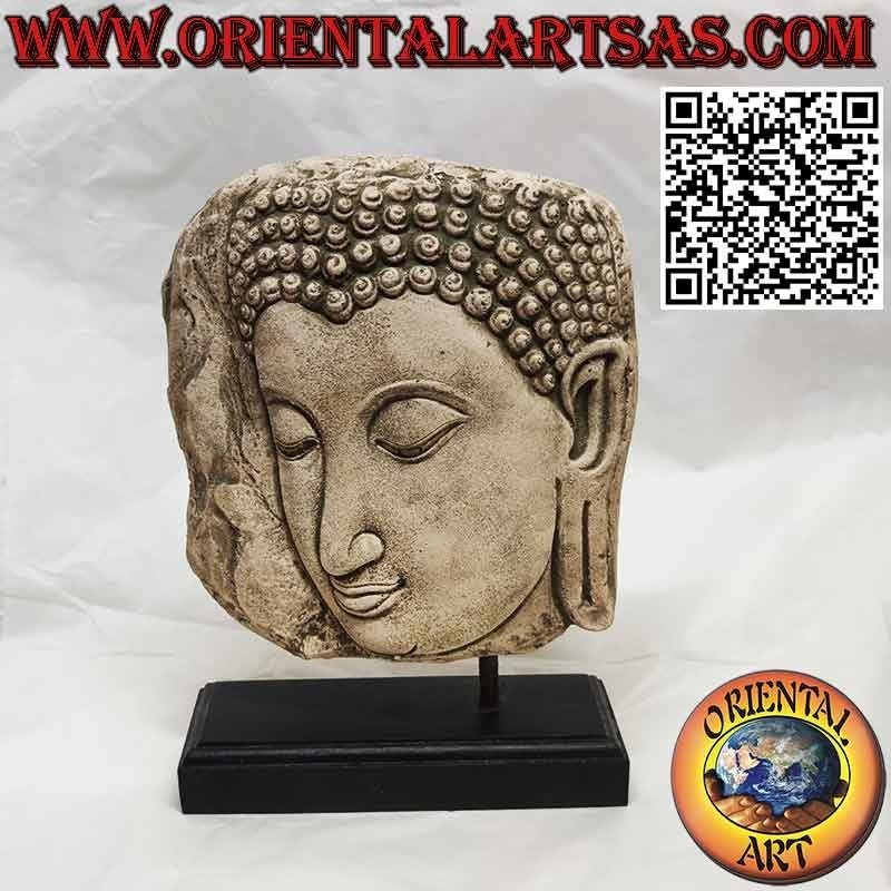 Escultura de piedra de cara de Buda de perfil con base de madera