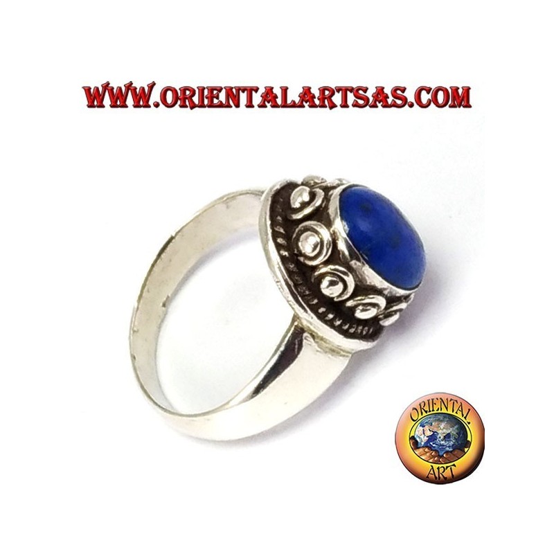 Silver ring with studSilver ring with studs around the box, with oval natural lapis lazuli