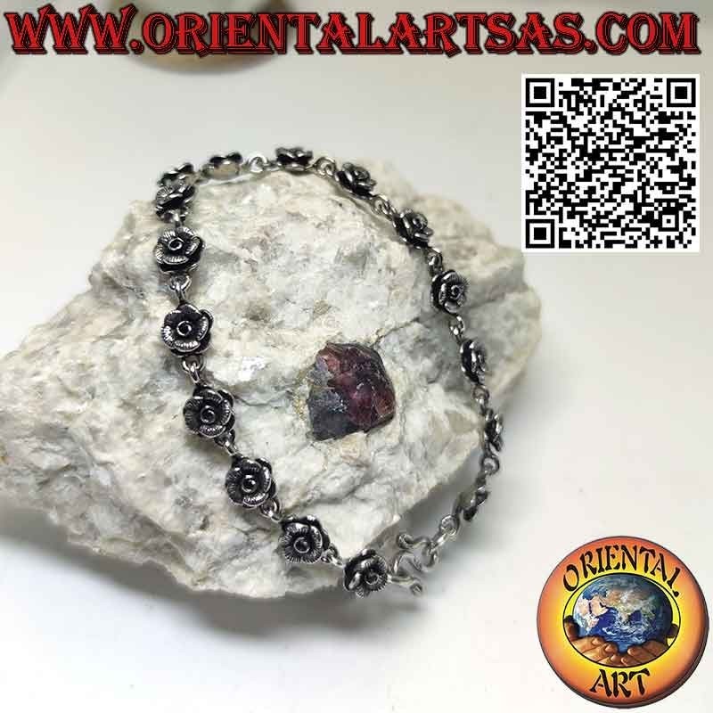 Bracciale con una fila di sedici rose realizzate in argento 925 ‰