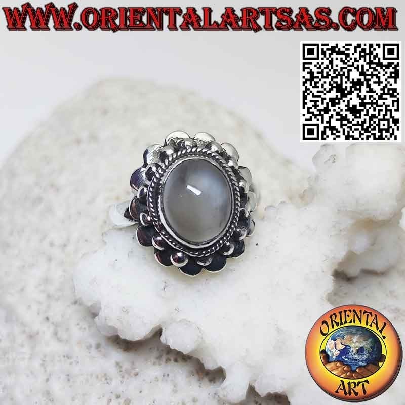 Bague en argent avec pierre de lune naturelle entourée de sphères