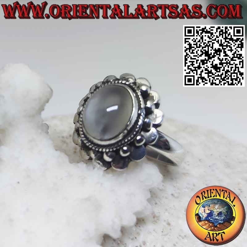 Bague en argent avec pierre de lune naturelle entourée de sphères