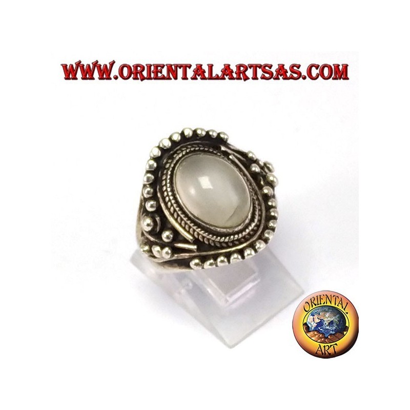 Silver ring with oval stone (adularia) oval with asymmetrical ball decorations