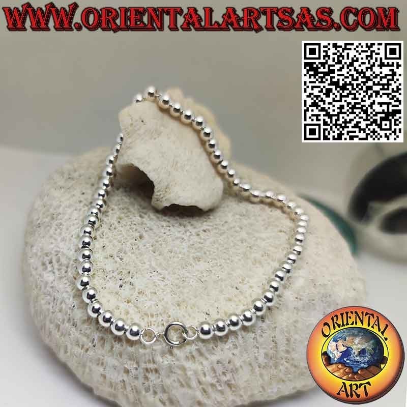 Bracelet en argent 925‰ avec sphères de 4 mm. enfilé sur une chaîne