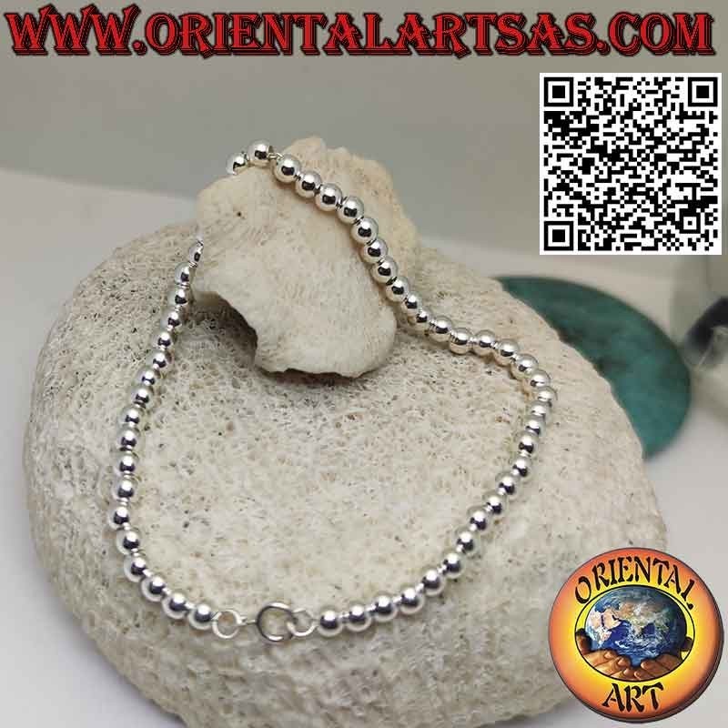 Bracelet en argent 925‰ avec sphères de 4 mm. enfilé sur une chaîne