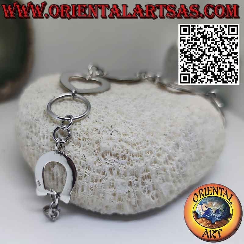 Silver bracelet with 1 round plate 2 hearts and 1 horseshoe
