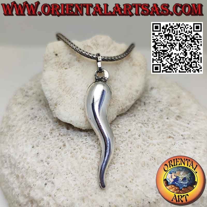 Silver pendant with lucky horn against the evil eye