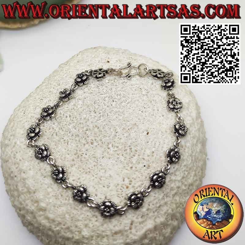 Bracelet avec seize roses en argent 925 ‰ en rangées réunies par un anneau