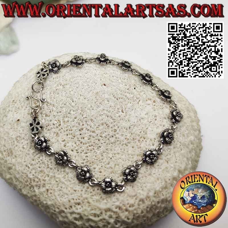 Bracelet with sixteen roses in 925 ‰ silver in rows joined by a ring