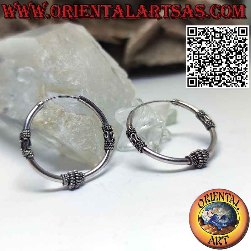 Pendientes circulares de plata con 3 partes trabajadas en espiral y ondas